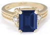 Emerald Cut Blue Sapphire Ring in 14k yellow gold