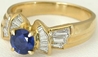 Designer Natural Round Sapphire and Baguette Diamond Engagement Ring set in Solid 18k yellow gold for sale