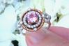 Natural Round Pink Sapphire Ring with real diamond halo and rose gold rope design set in 14k white gold for sale