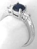 Round Blue Sapphire and White Sapphire Three Stone Ring in 14k white gold