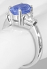 Oval Blue Sapphire and Trillion White Sapphire Three Stone Ring in 14k white gold