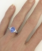 Genuine Oval Blue Sapphire and Trillion White Sapphire Three Stone Ring in 14k white gold