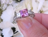 Real Princess Cut Pink Sapphire Three Stone Engagement Ring with Princess Cut Side Diamonds in a 14k white gold setting for sale
