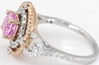 Round Pink Sapphire Ring with Diamond Halo and rose gold rope design