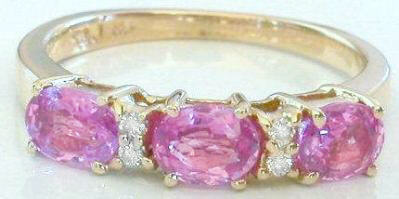 Triple East West Set Oval Natural Pink Sapphire Ring in 14k yellow gold for sale