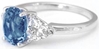 Oval Blue and White Trillion Sapphire Ring in 14k white gold