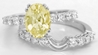 Oval Yellow Sapphire and Diamond Engagement Ring Set in 14k white gold