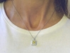 Natural Yellow Sapphire Pendant in 14k white gold- princess cut with diamond halo shown on the neck
