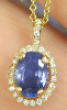 Natural Sapphire Pendant with a Diamond Halo set in Real 14k yellow gold for sale