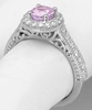 Light Pink Sapphire and Diamond Halo Ring in 14k white gold