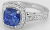 Cushion Sapphire and Diamond Halo Ring in 14k white gold