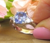Natural Ceylon Blue Sapphire and White Sapphire Three Stone Engagement Ring in 14k white gold for sale