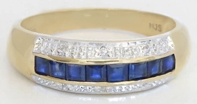 Natural Blue Sapphire Channel Set Ring with Diamond Accents in solid 14k yellow gold for sale