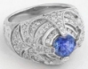Stunning art deco design blue sapphire ring with pavÃ© diamond accents in white gold