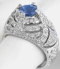 Luxury sapphire and diamond vintage designed bold cocktail ring with intricate details