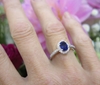 Natural Oval Blue Sapphire Ring with Real Diamond Halo in Ring with a solid 14k white gold Diamond Band for sale