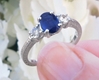 Natural oval blue sapphire and real round diamond wedding ring in white gold for sale
