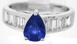 Buy a Pear Cut Natural Blue Sapphire Engagement Ring with Real Baguette Diamonds in solid 14k white gold