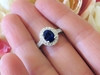 Intense cornflower blue natural sapphire ring with a diamond halo in real platinum for sale