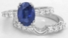 Oval Sapphire and Diamond Engagement Ring in 14k white gold