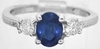 Natural oval blue sapphire and round diamond engagment ring in solid platinum for sale