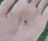 Oval Cut genuine emerald solitaire pendant with diamond bail in 14k yellow gold