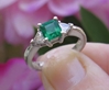 Natural Colombian Emerald Engagement Ring with Trillion Diamonds in 14k White Gold for sale. Classic Three stone ring.