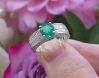 Eye Catching Exquisite Round Emerald and Princess Cut Diamond Engagement Ring in 18k white gold