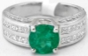 Emerald Engagement Ring with 7mm Round Emerald and Princess Cut Diamonds Ring in 18k white gold