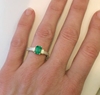 Emerald Ring with Baguette Diamonds in 14k white gold