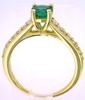 Genuine Round Emerald Engagement Ring in yellow gold