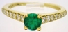 Round Emerald and Diamond Ring in 14k yellow gold