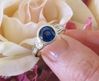Bezel Set Natural Blue Sapphire Engagement ring with real princess and baguette diamonds in solid 18k white gold for sale