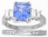 Radiant Blue Sapphire Engagement Ring with Baguette Diamonds in 18k white gold