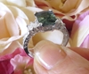 Green Sapphire Engagement Ring with Real Baguette Diamonds in an 18k white gold setting for sale