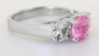 natural pink sapphire engagement ring with white sapphire sides