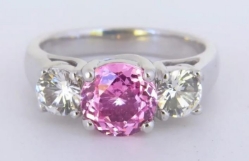 three-stone pink sapphire and white sapphire ring in 18k white gold
