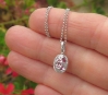 Oval Unheated Natural Pink Sapphire Pendant with Real Diamond Halo in solid 14k whtie gold for sale