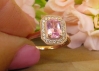 Octagonal halo ring with radiant pink sapphire and filigree basket