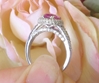 Buy a Fine Natural Cushion Cut Intense Pink Sapphire Ring with Real Diamond Halo and Split Shank Engagment Mounting in solid 18k White Gold