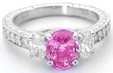 Oval Natural Pink Sapphire and Oval Diamond Three Stone Ring in 14k white gold for sale