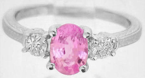 for sale: Natural Oval Pink Sapphire Engagement Ring with Round White Sapphire Sides in ornate 14k white gold band