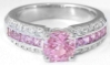 Round cut natural pink sapphire ring in 14k white gold