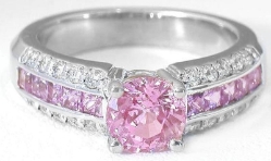 Round cut natural pink sapphire ring in 14k white gold