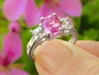 Radiant cut natural bright pink sapphire three stone engagement ring in solid platinum for sale