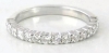 Natural trillion cut pink sapphire ring with a diamond halo in 14k white gold shown with it's matching diamond band