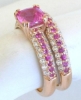Side View of Three Rows of Pave Diamonds and Pink Sapphires with Natural Cushion Cut Pink Sapphire Center