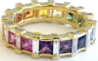 Princess cut natural rainbow sapphire eternity ring in gold
