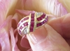 Real Natural Ruby Fashion Ring with channel set rubies in swirl design. Great gift idea.