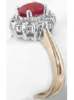 Profile View of Natural Ruby and Diamond Engagement Ring in 14k white and yellow gold Diamond Halo Setting